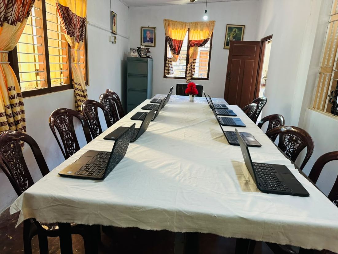Laptops set up and ready for an IT training session